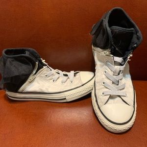 Kids high top converse with back ruffle detail.